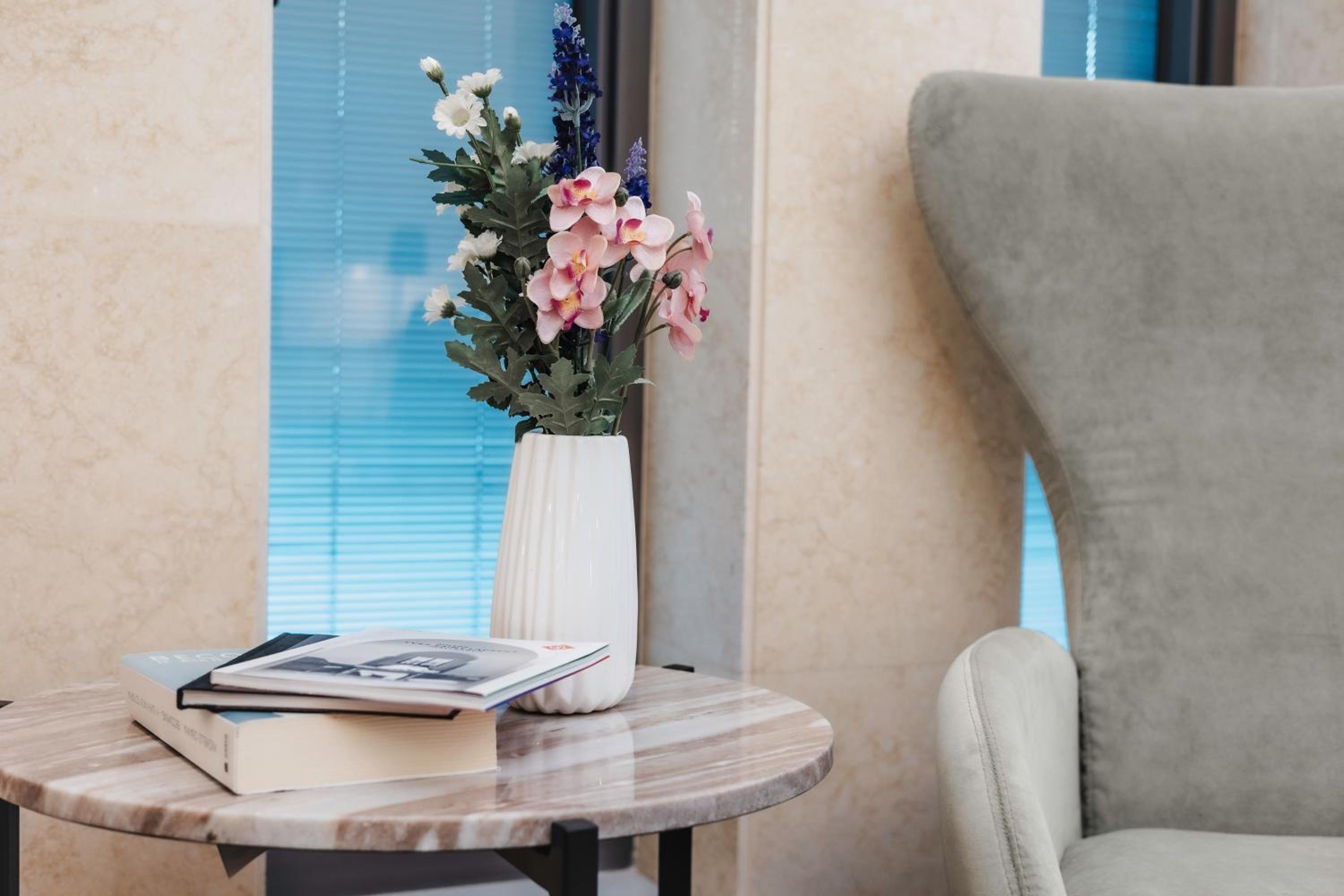 16 EXECUTIVE SUITES
