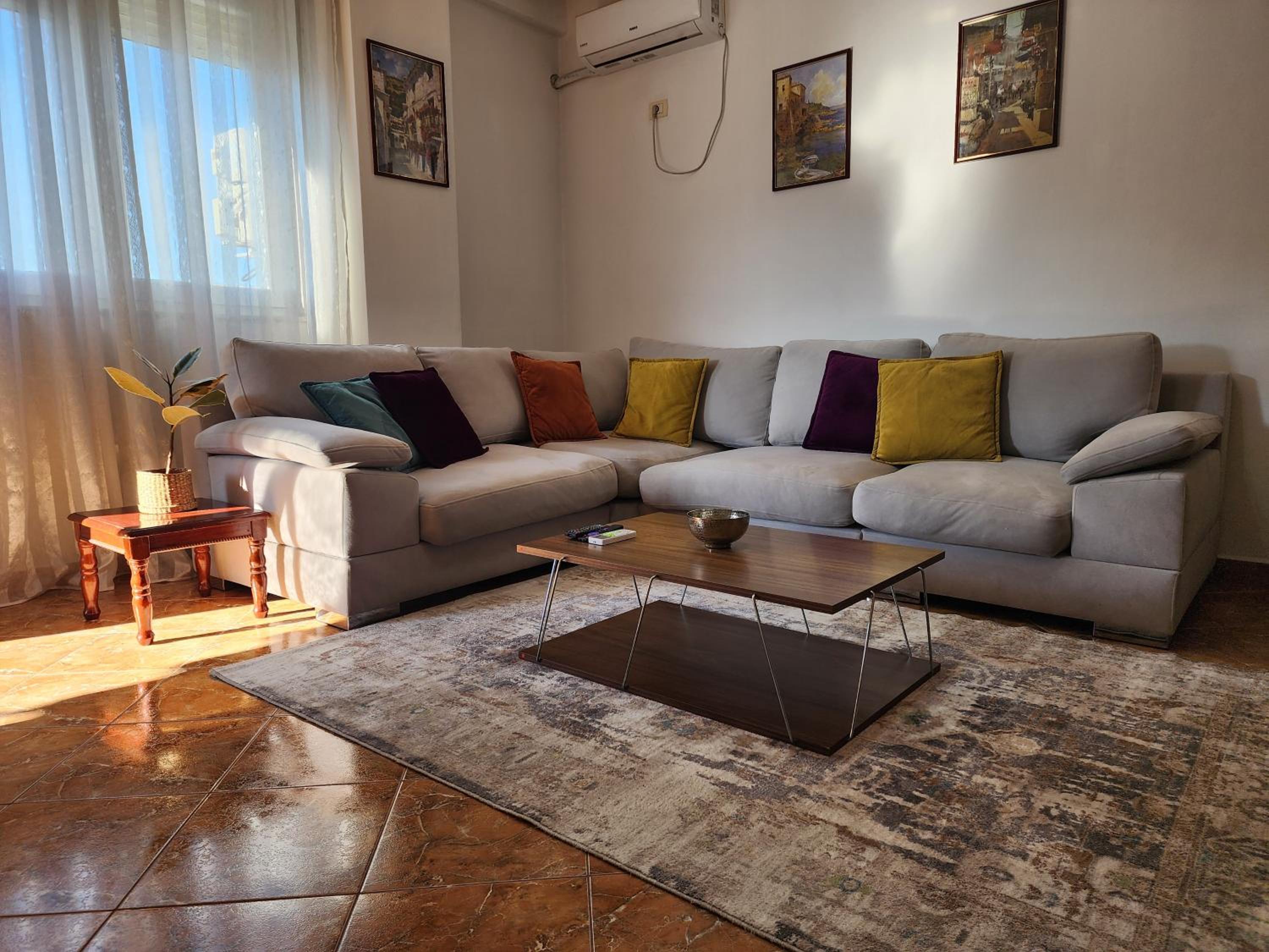 Cozy sunlit apartment with scenic balcony view