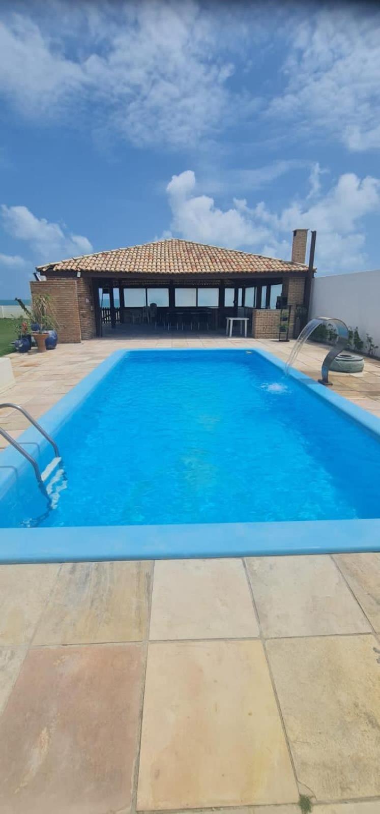 Casa Medalhão Pé na Areia