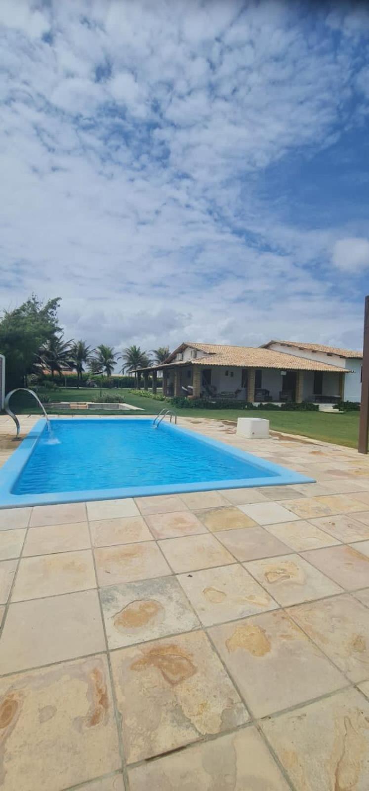 Casa Medalhão Pé na Areia
