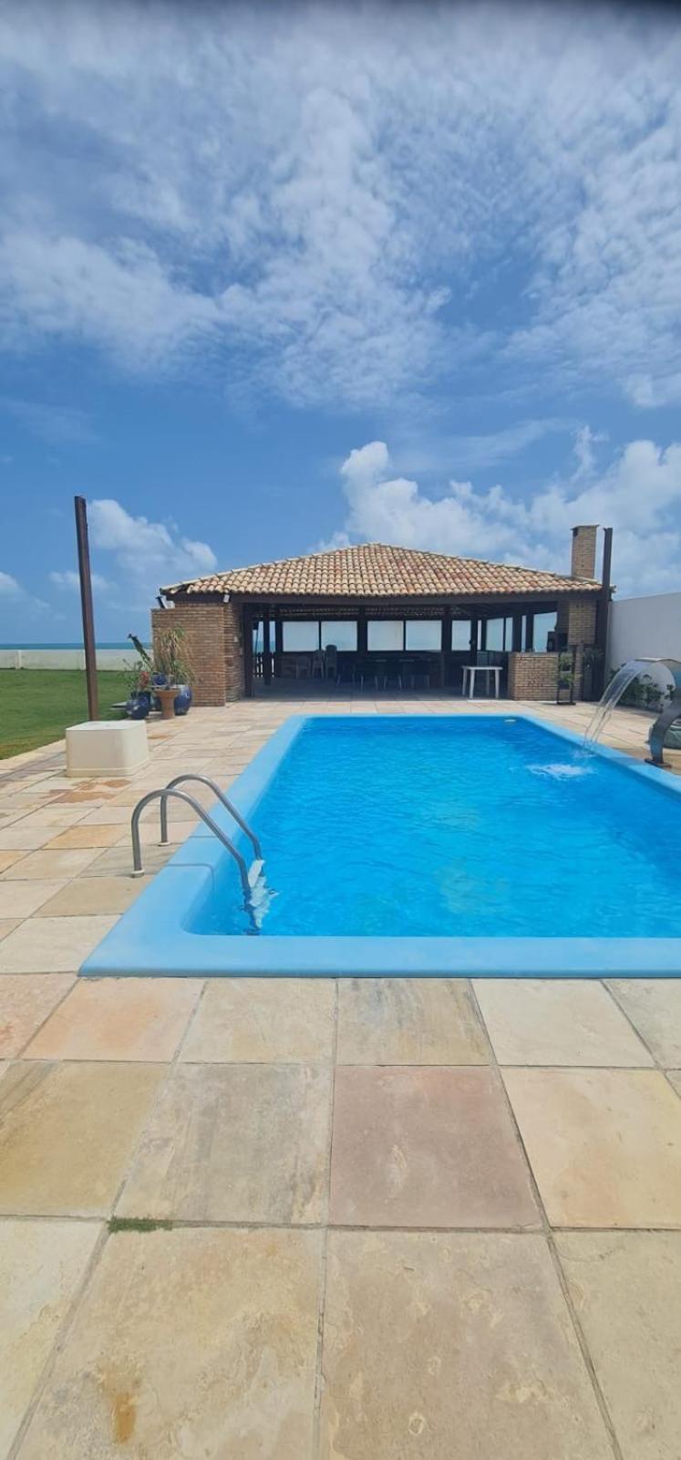 Casa Medalhão Pé na Areia
