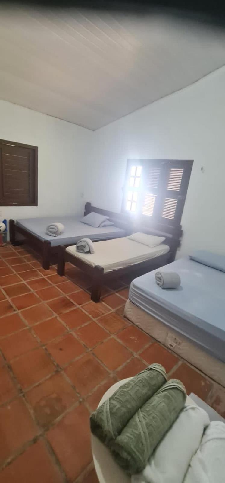 Casa Medalhão Pé na Areia