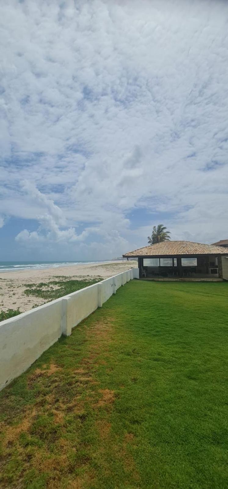Casa Medalhão Pé na Areia