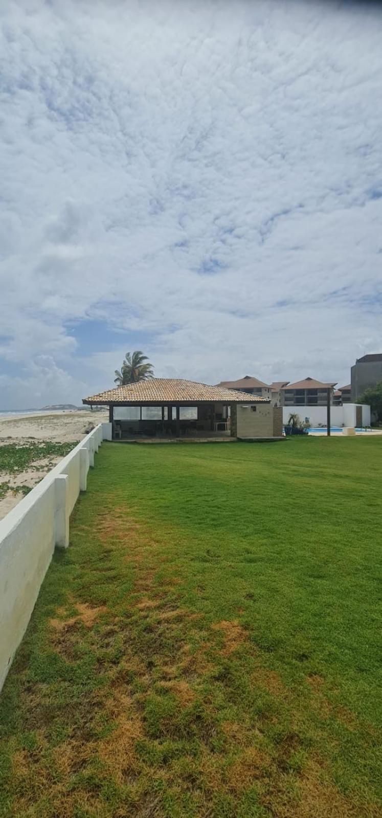 Casa Medalhão Pé na Areia