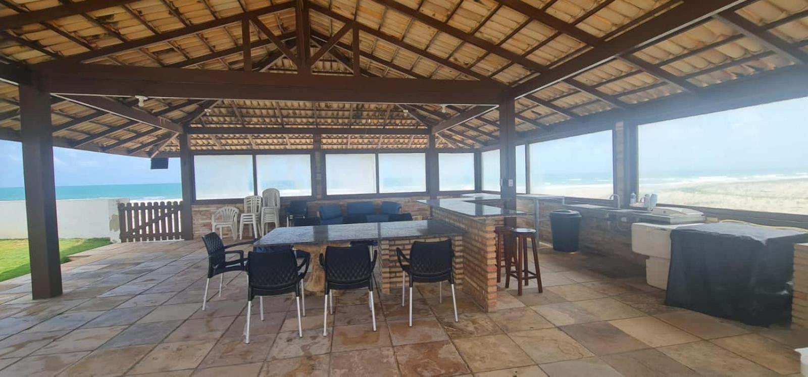 Casa Medalhão Pé na Areia
