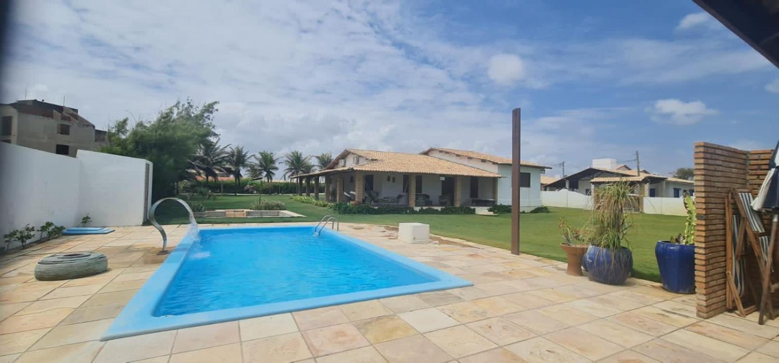 Casa Medalhão Pé na Areia