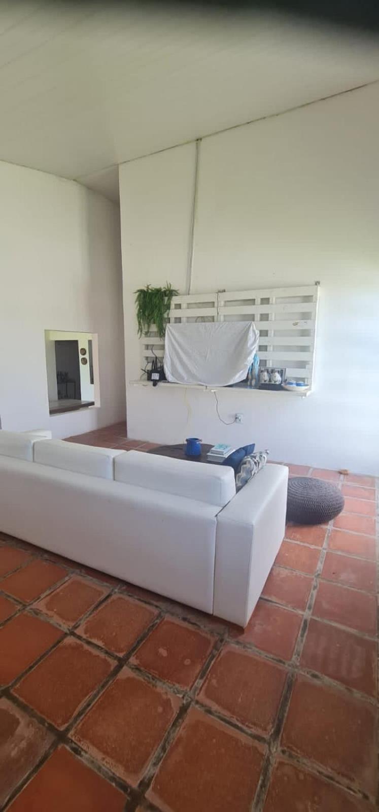Casa Medalhão Pé na Areia