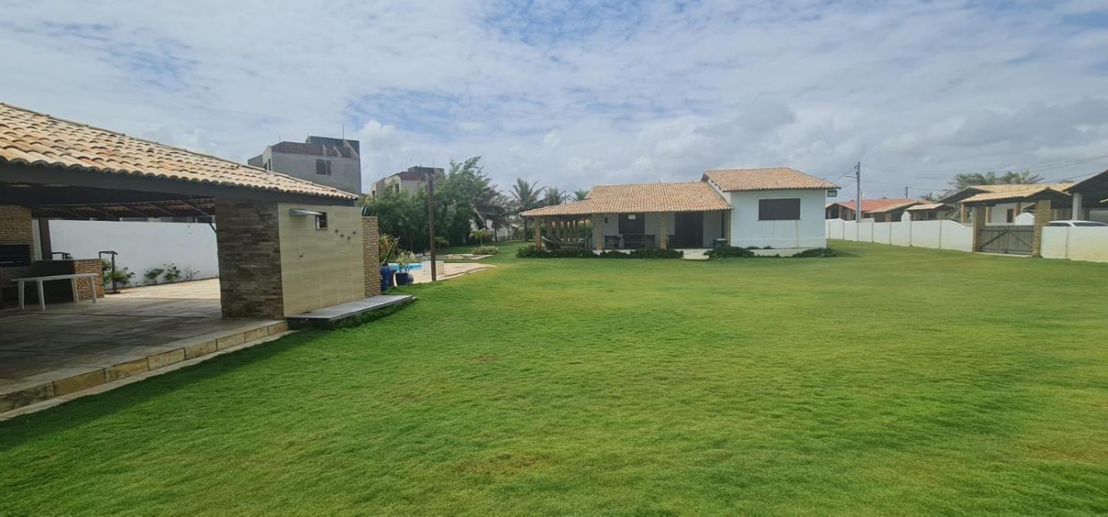 Casa Medalhão Pé na Areia