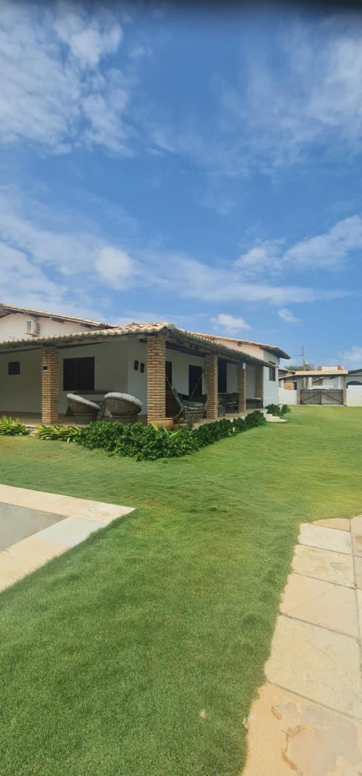Casa Medalhão Pé na Areia