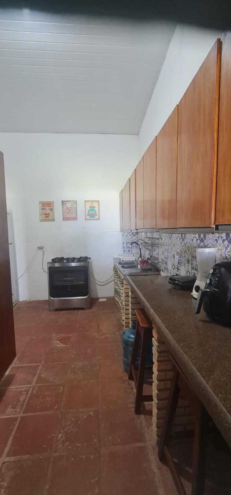 Casa Medalhão Pé na Areia
