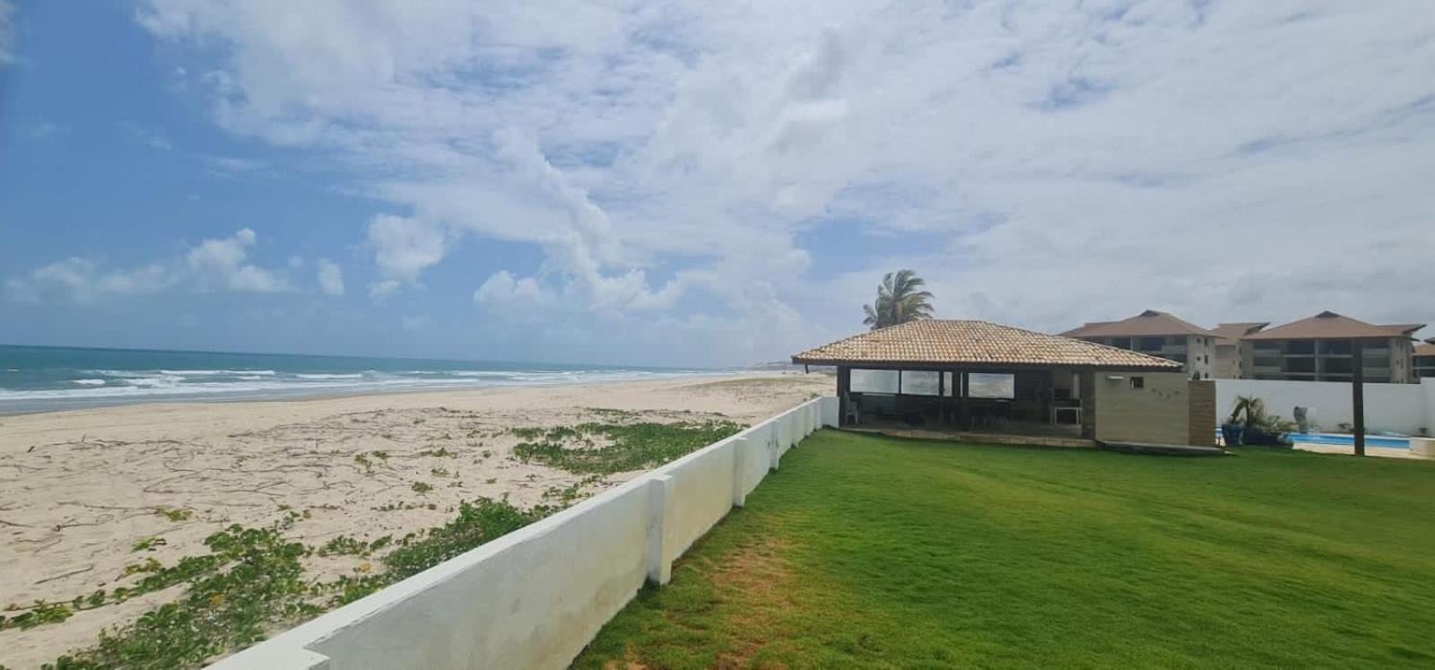 Casa Medalhão Pé na Areia