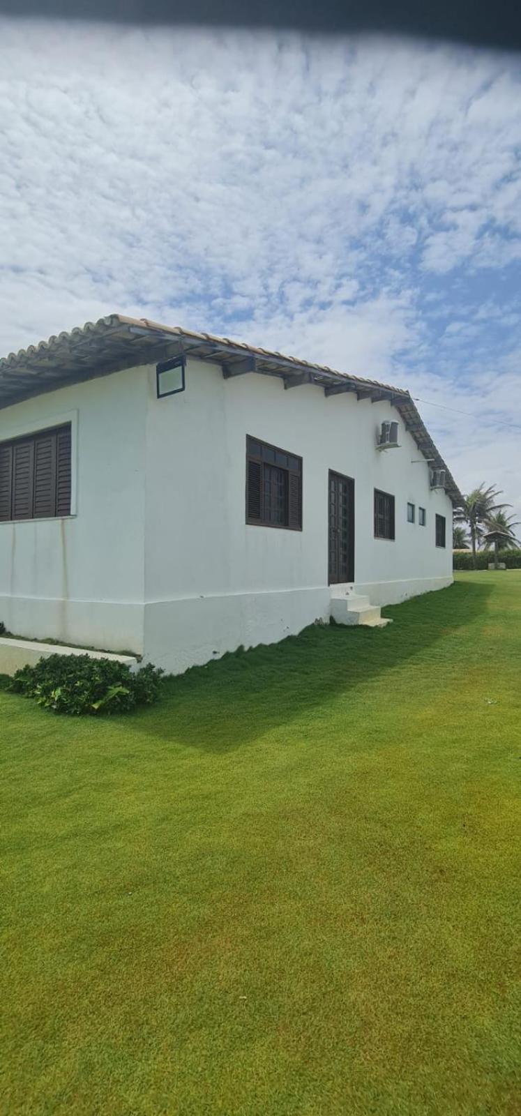 Casa Medalhão Pé na Areia