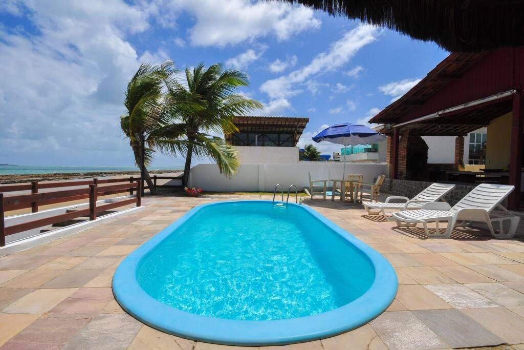 Casa “Pé na Areia”