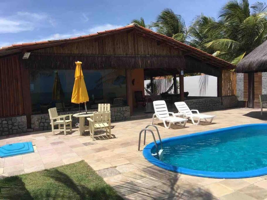 Casa “Pé na Areia”