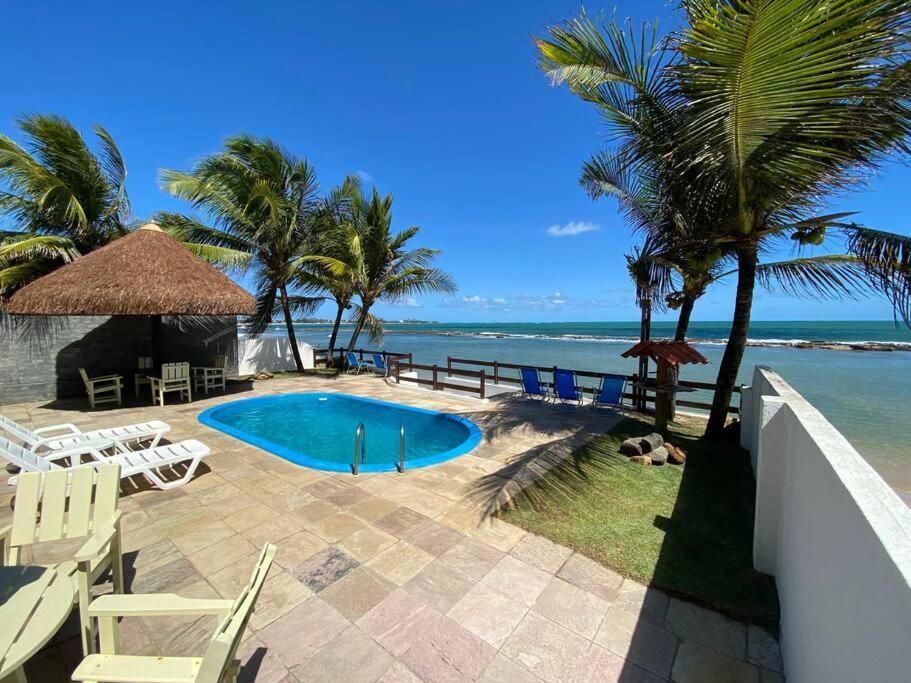 Casa “Pé na Areia”