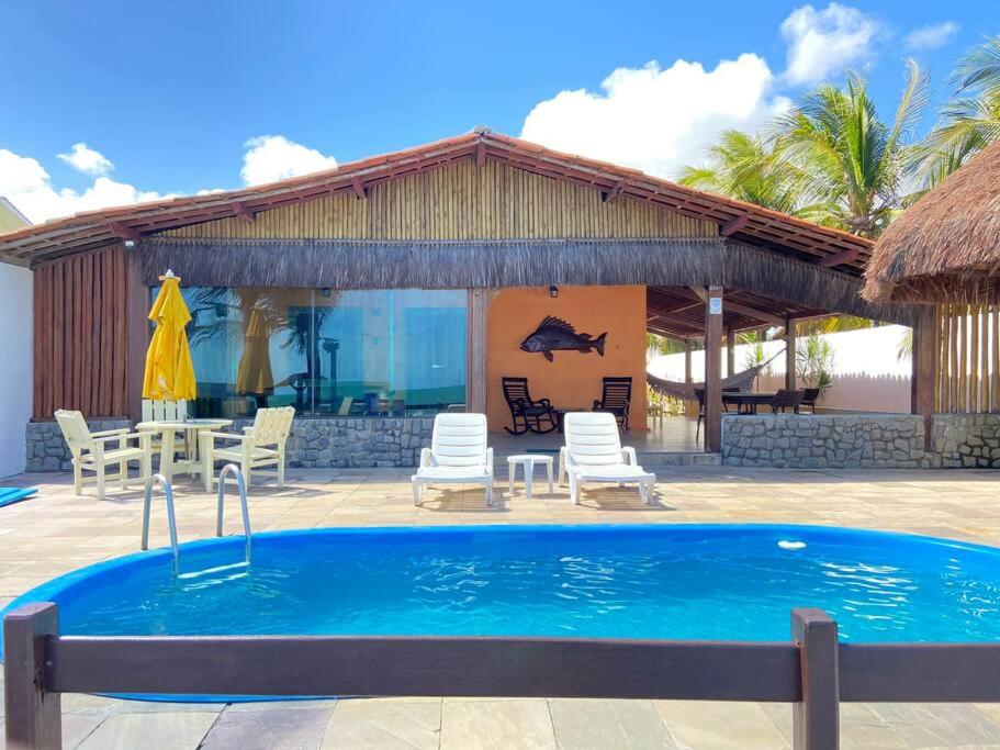 Casa “Pé na Areia”