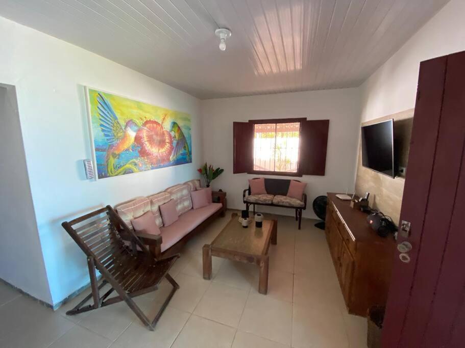 Casa “Pé na Areia”