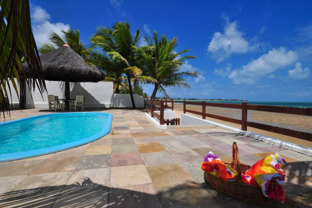 Casa “Pé na Areia”