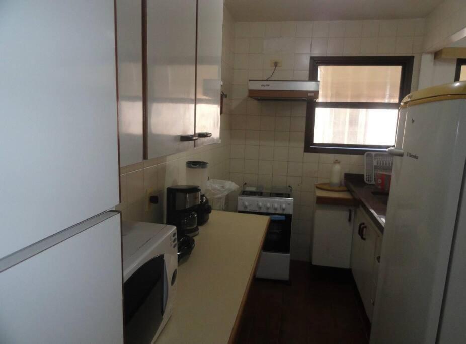 Pitangueiras com cadeira e guarda-sol exclusivo, limpeza diária, piscina climatizada e Wi-Fi