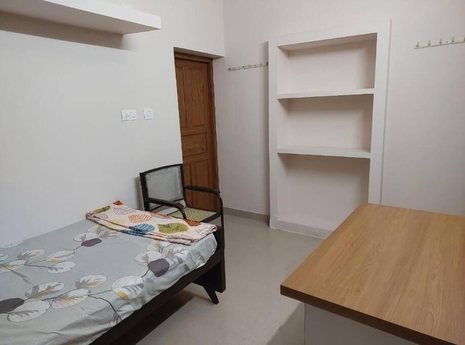 Guruvayur Homestay - 2 AC Bedrooms, Hall & Veranda view 2