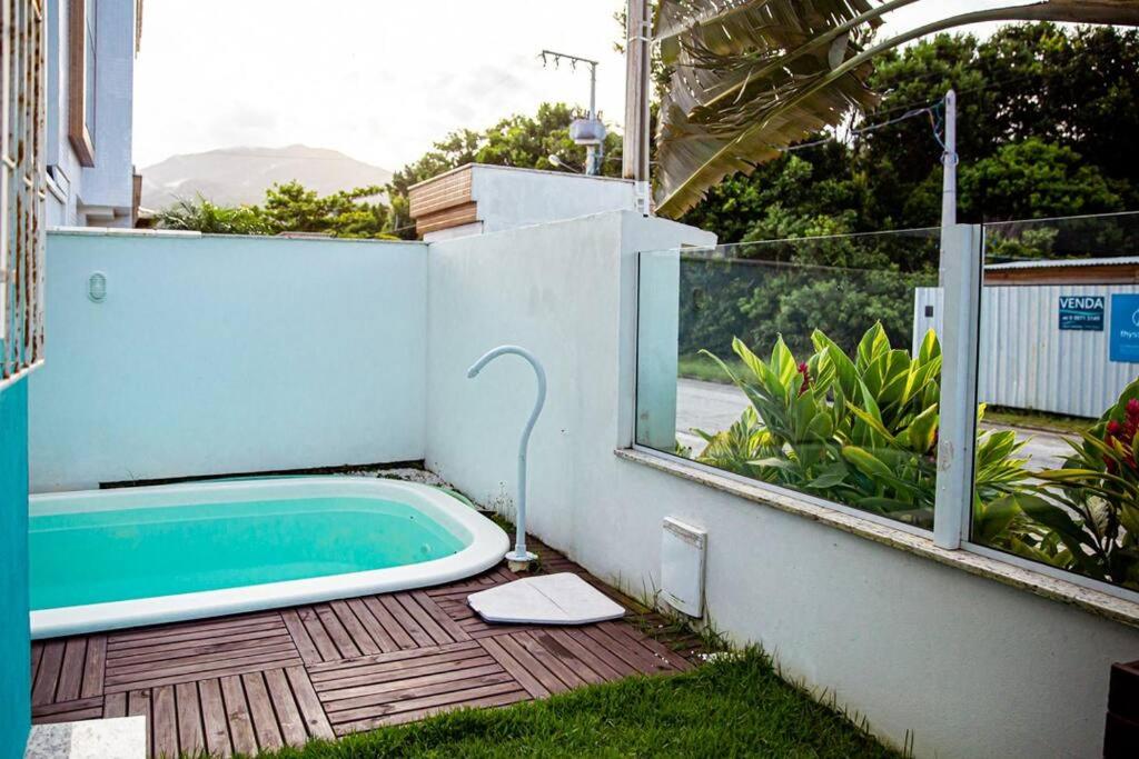 Praia e Piscina em Palmas do Arvoredo