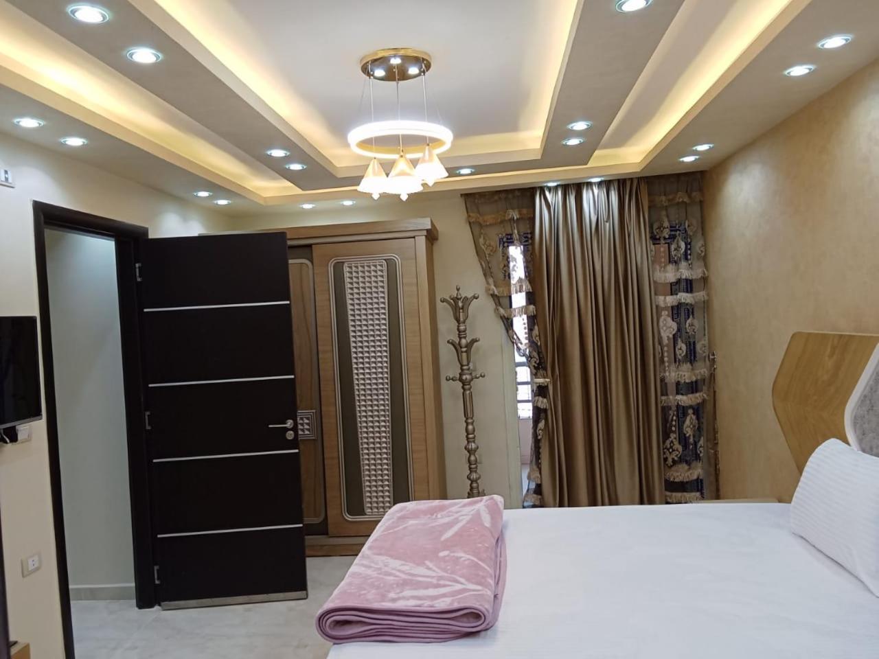 cozy and modern apartment in central location in Cairo Mohandessin near Nile