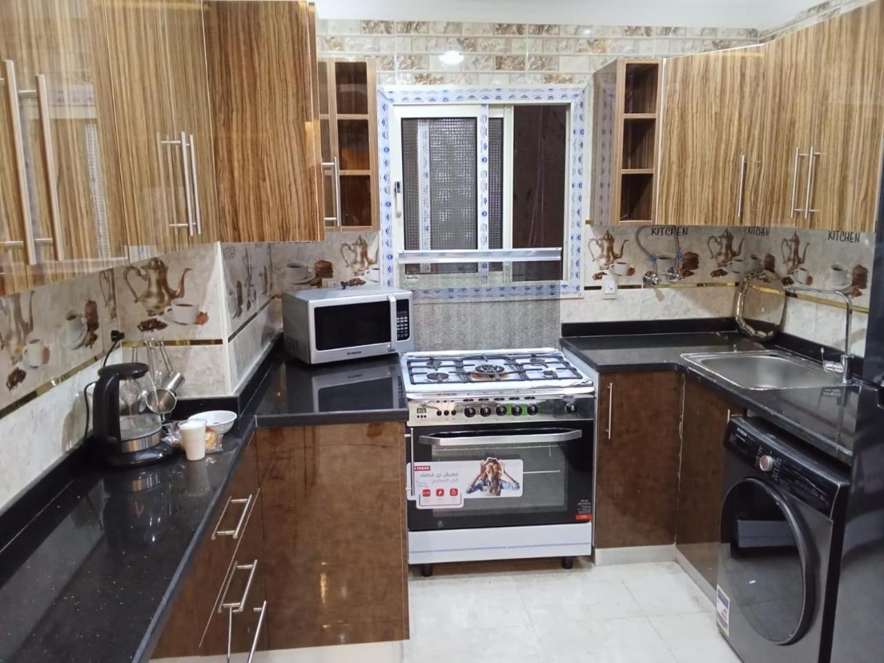 cozy and modern apartment in central location in Cairo Mohandessin near Nile