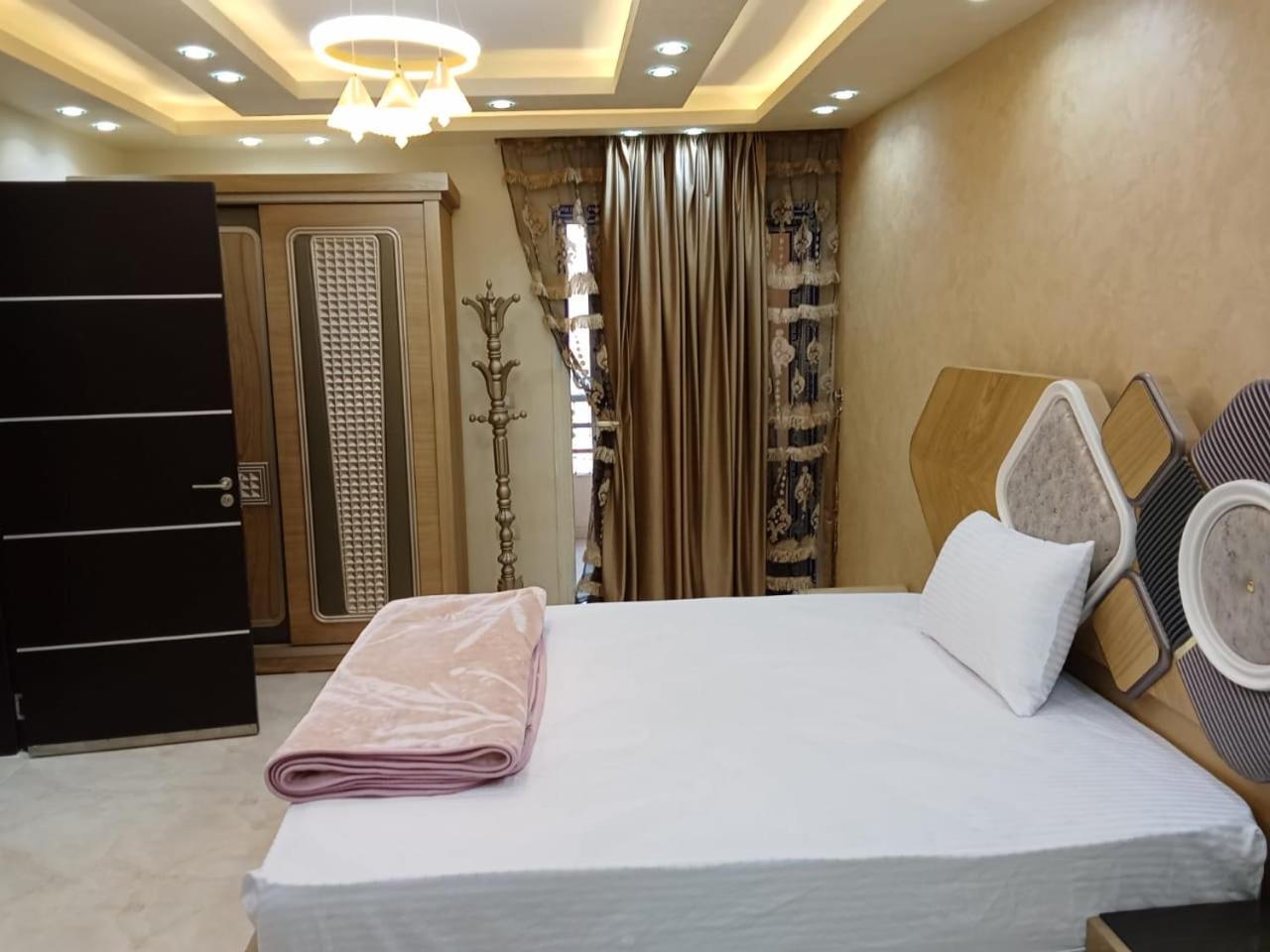 cozy and modern apartment in central location in Cairo Mohandessin near Nile