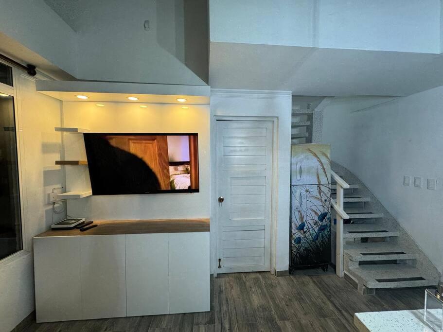 Cómodo apartamento con vista al mar y la montaña