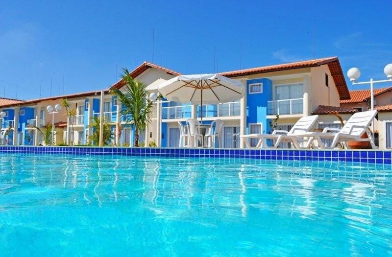 Casas no Residencial Mont Sião com 1, 2 ou 3 suítes (todas com ar condicionado) condomíno a poucos metros da praia de Taperapuã (Axé Moi), com 2 piscinas a
