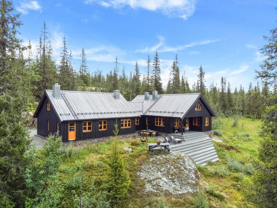 Your Ideal Getaway Awaits in This Charming Cabin Retreat view 3