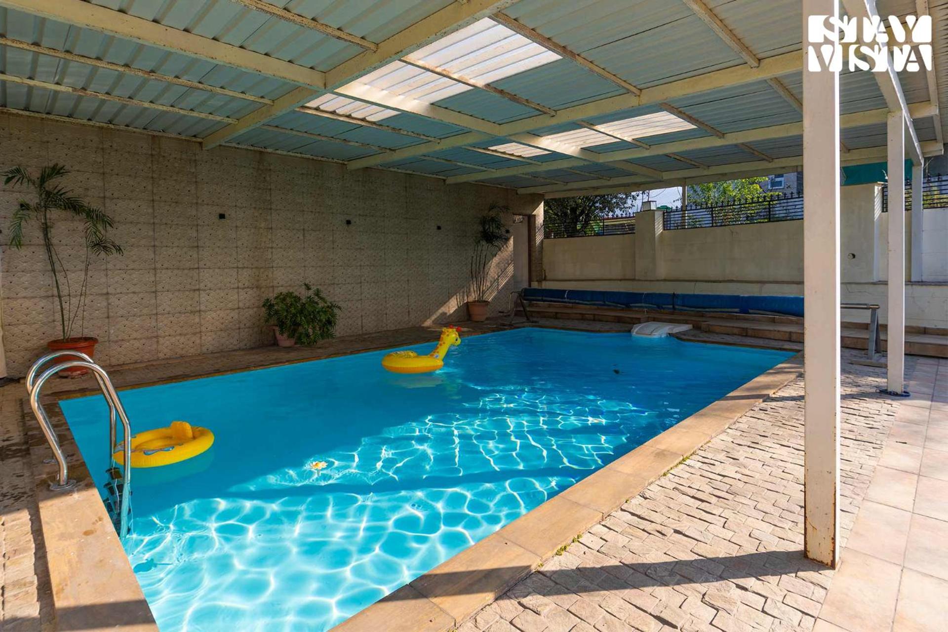 StayVista at Address By The Khul with Pool, Home Theatre and Lawn having 2BR and 1BR in Dharamshala