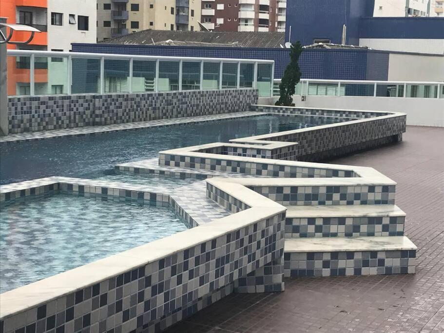 Apto lindo e aconchegante na Praia Grande c/ vista