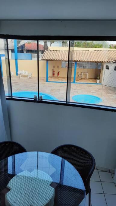 Apartamento azul no condomínio Mar de Cotovelo
