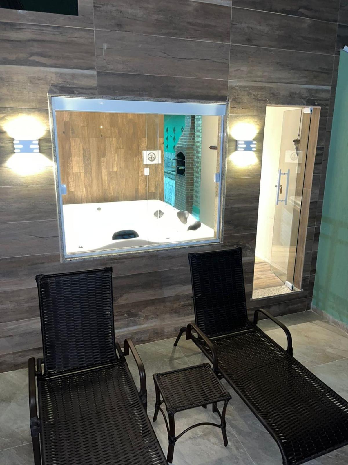 Casa agradável em frente a praia com jacuzzi/spa