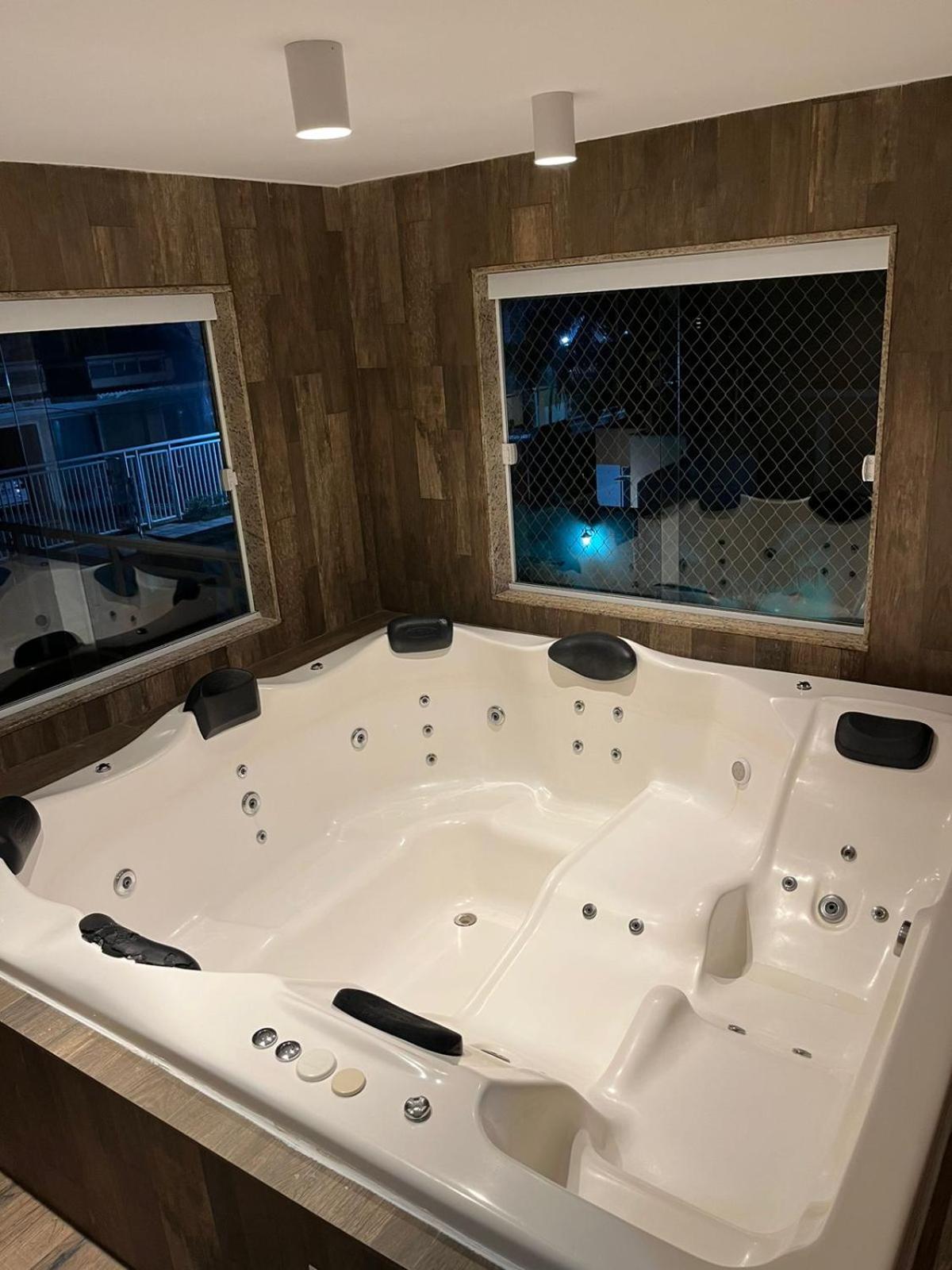 Casa agradável em frente a praia com jacuzzi/spa