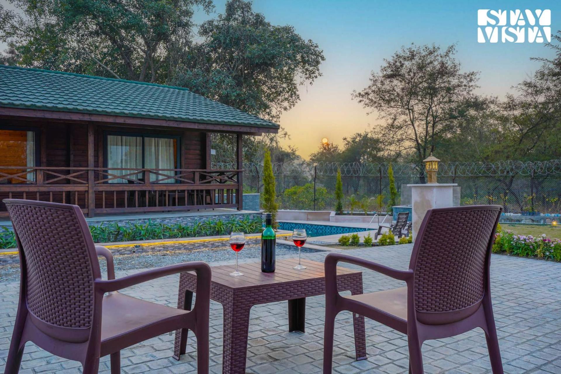 Secret Solace with Swimming Pool & Porch at Dehradun by StayVista view 5