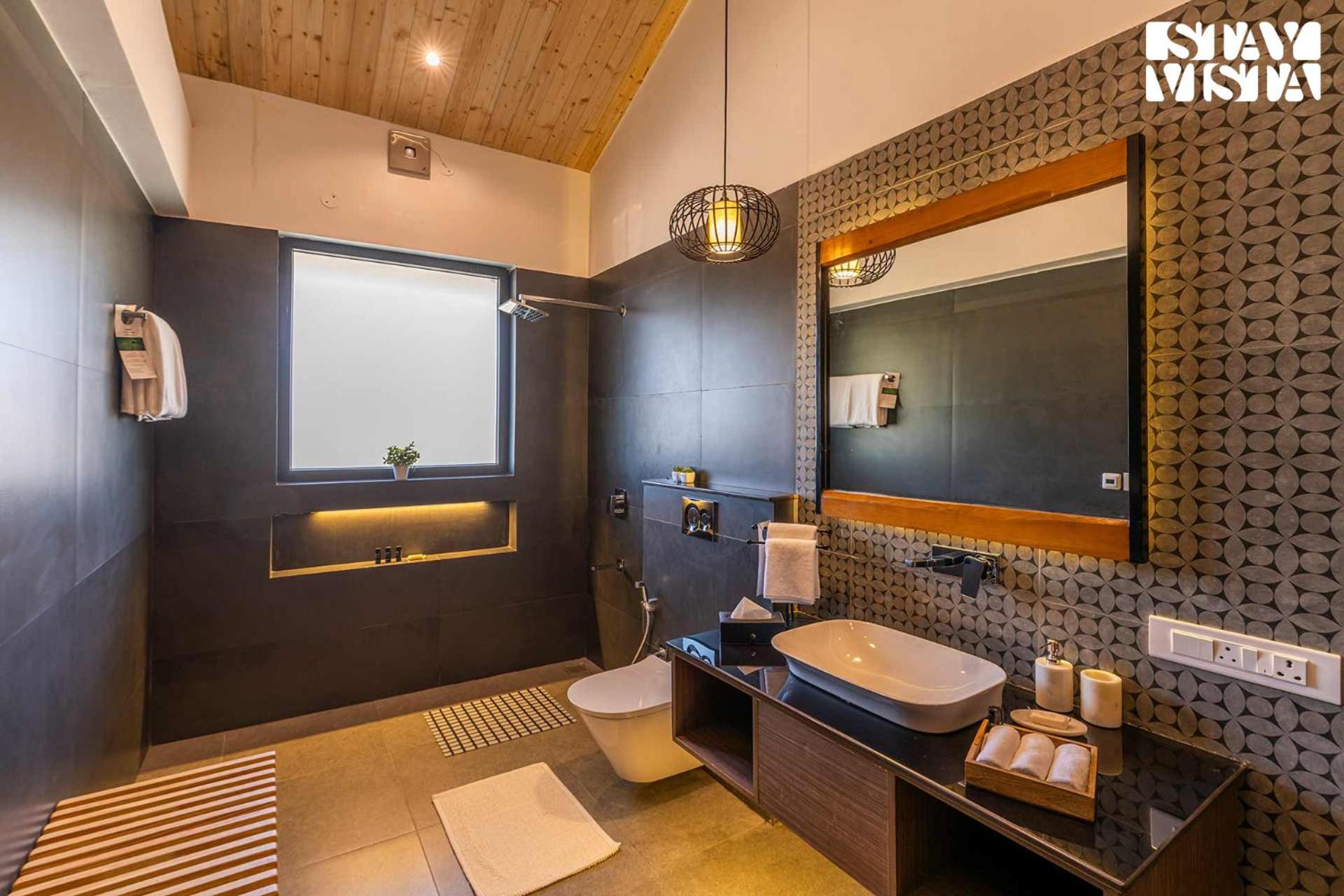 StayVista at Savara with Heated Infinity Pool and Jacuzzi