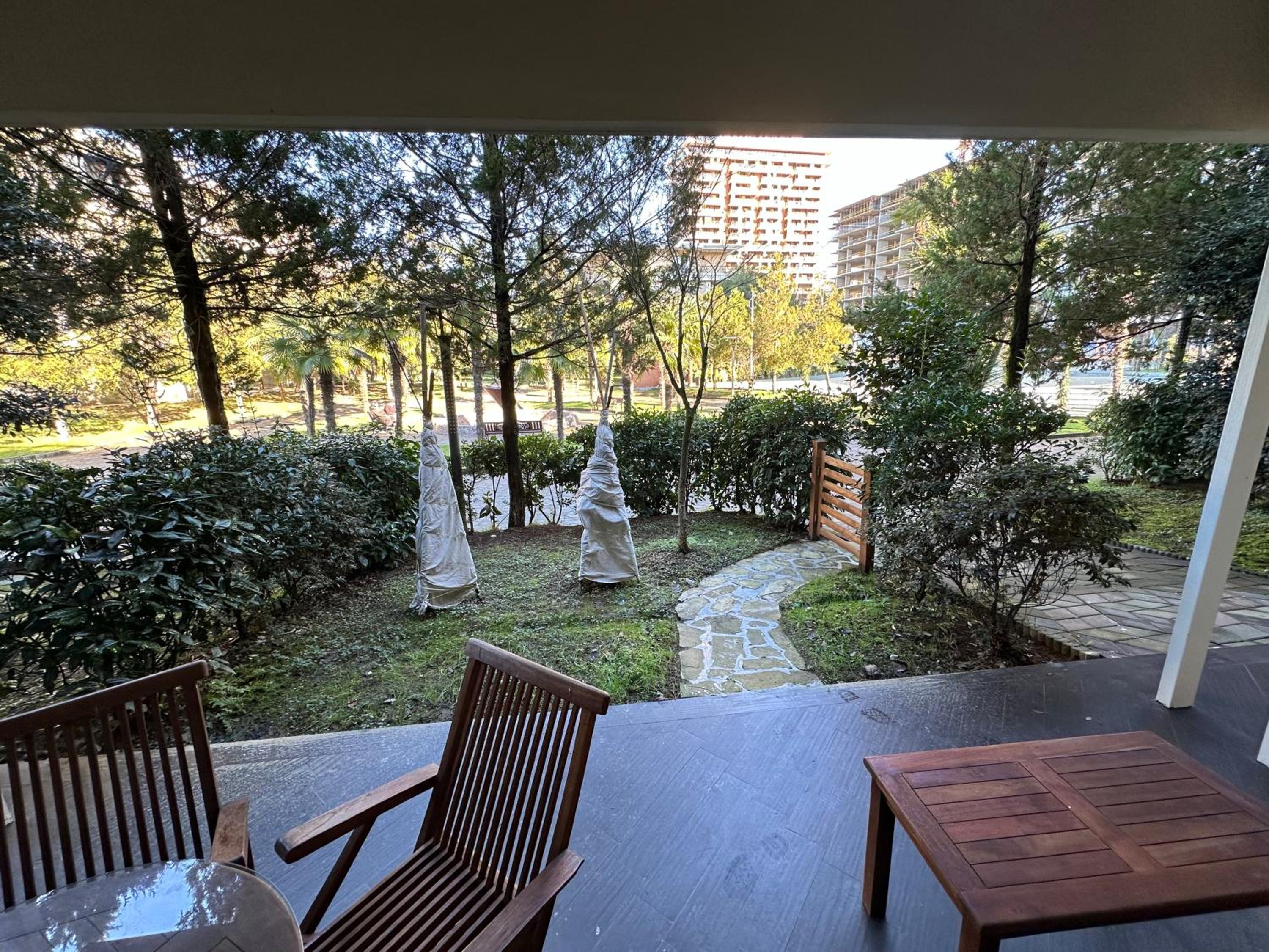 Seaside Apartment with a Private Garden view 3