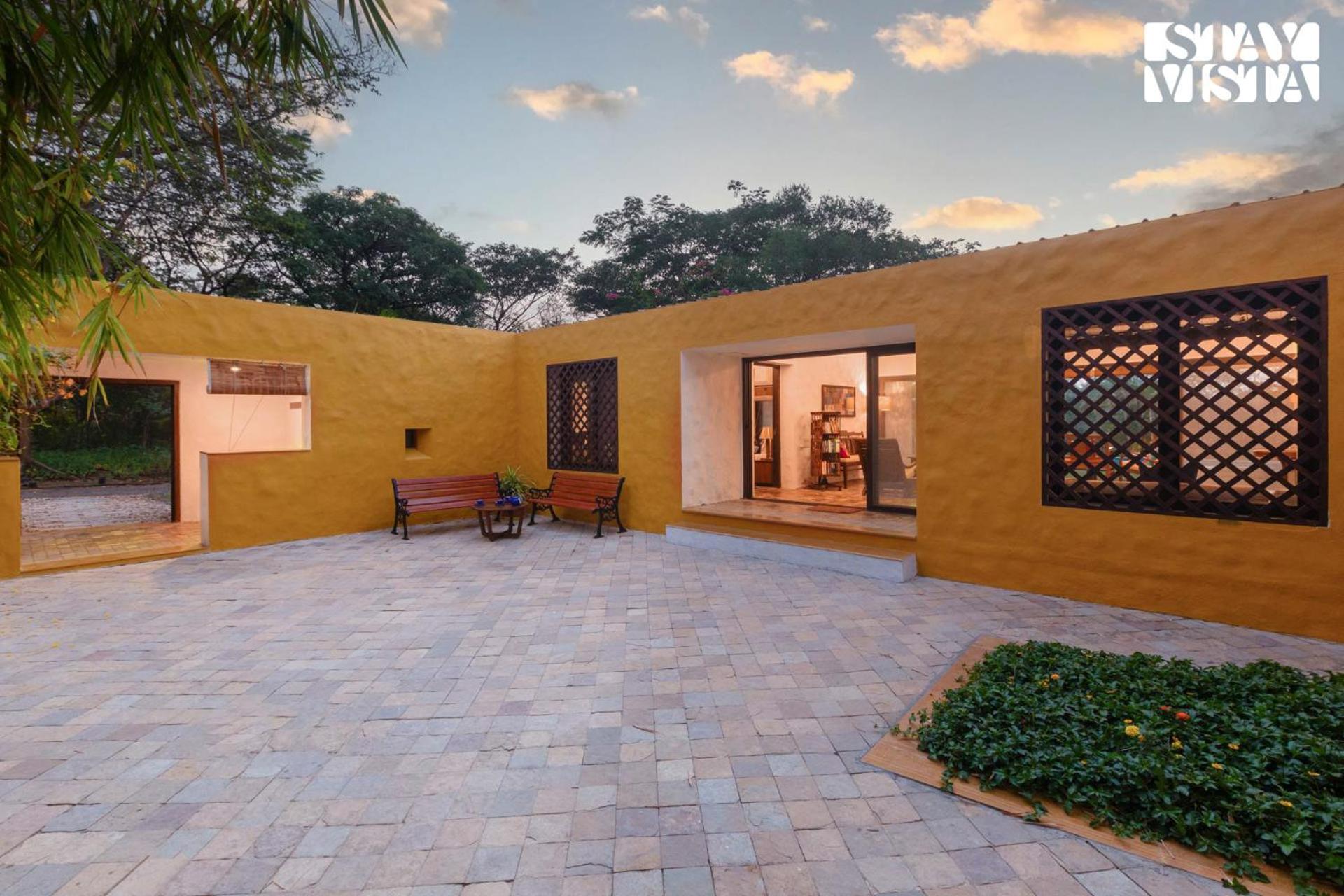 The Courtyard by StayVista - Private Pool with Rustic Charm, Vibrant Courtyard, Spacious Verandah & Garden view 3