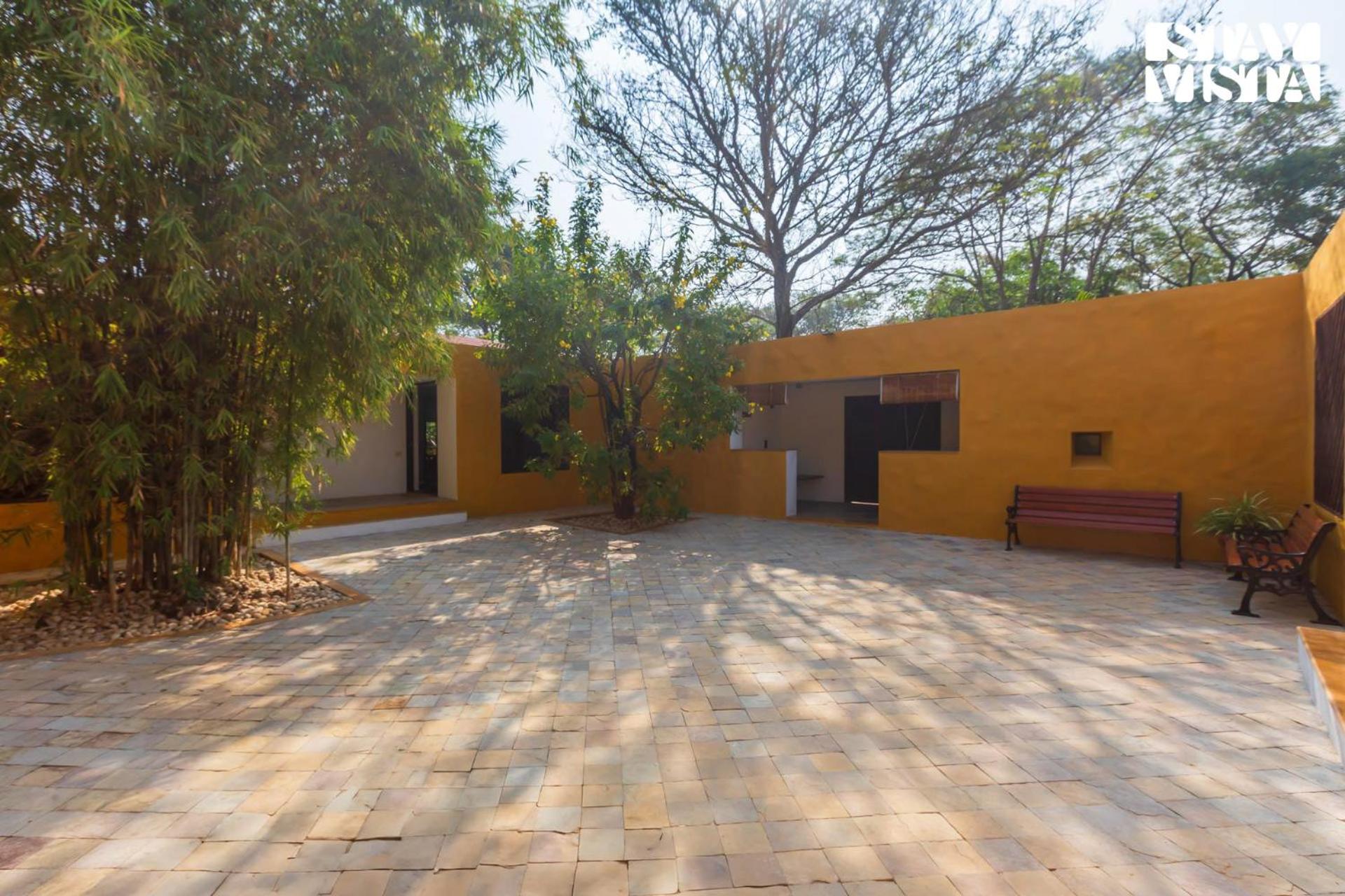 The Courtyard by StayVista - Private Pool with Rustic Charm, Vibrant Courtyard, Spacious Verandah & Garden view 4