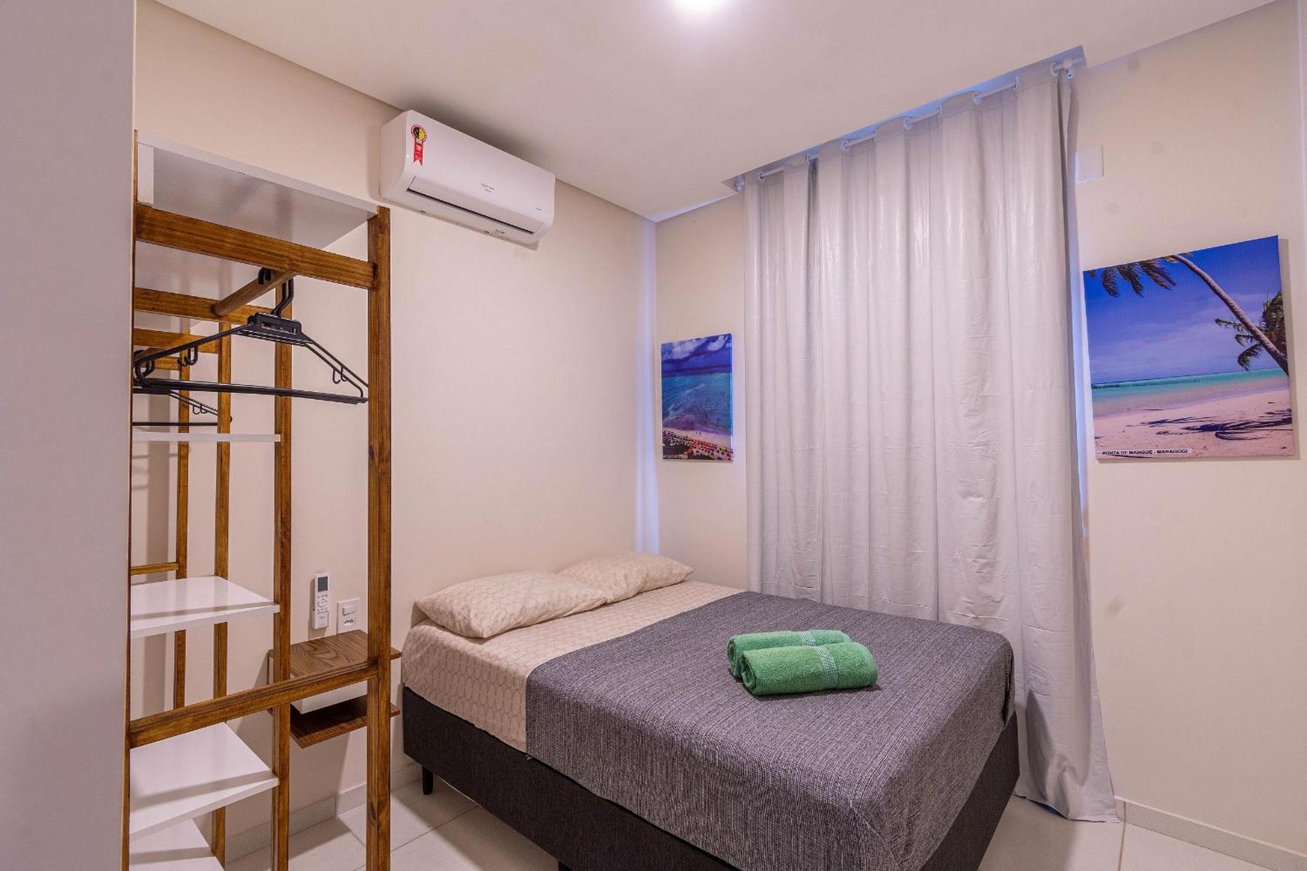 Flats Mar'Bella com Varanda para Relaxar e Praia para aproveitar, Cozinha equipada e Vaga de Garagem