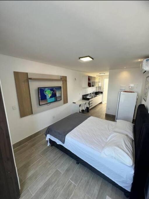 Flat com piscina a 200m da praia