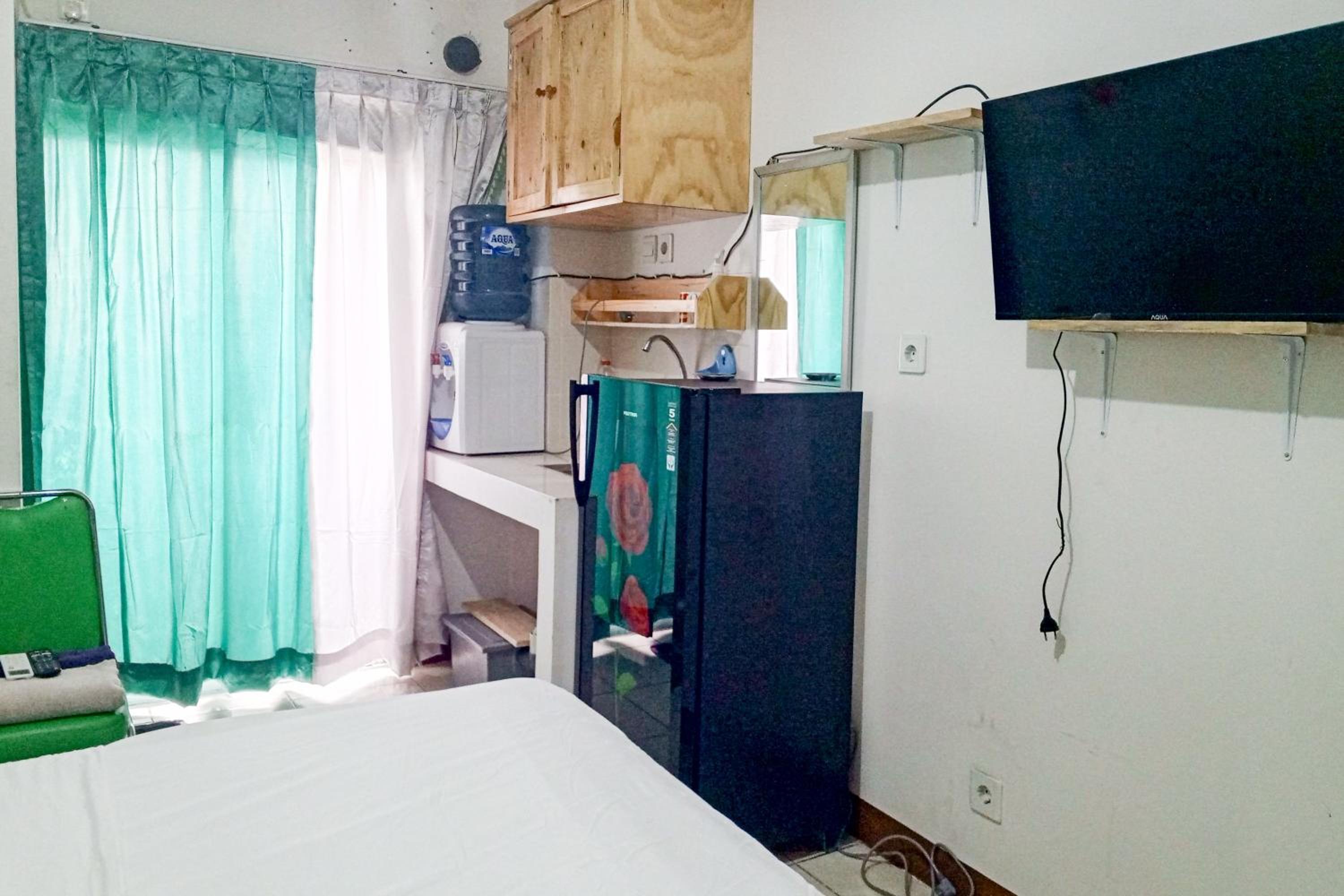 RedLiving Apartemen LoftVilles City - Pelangi Rooms view 2