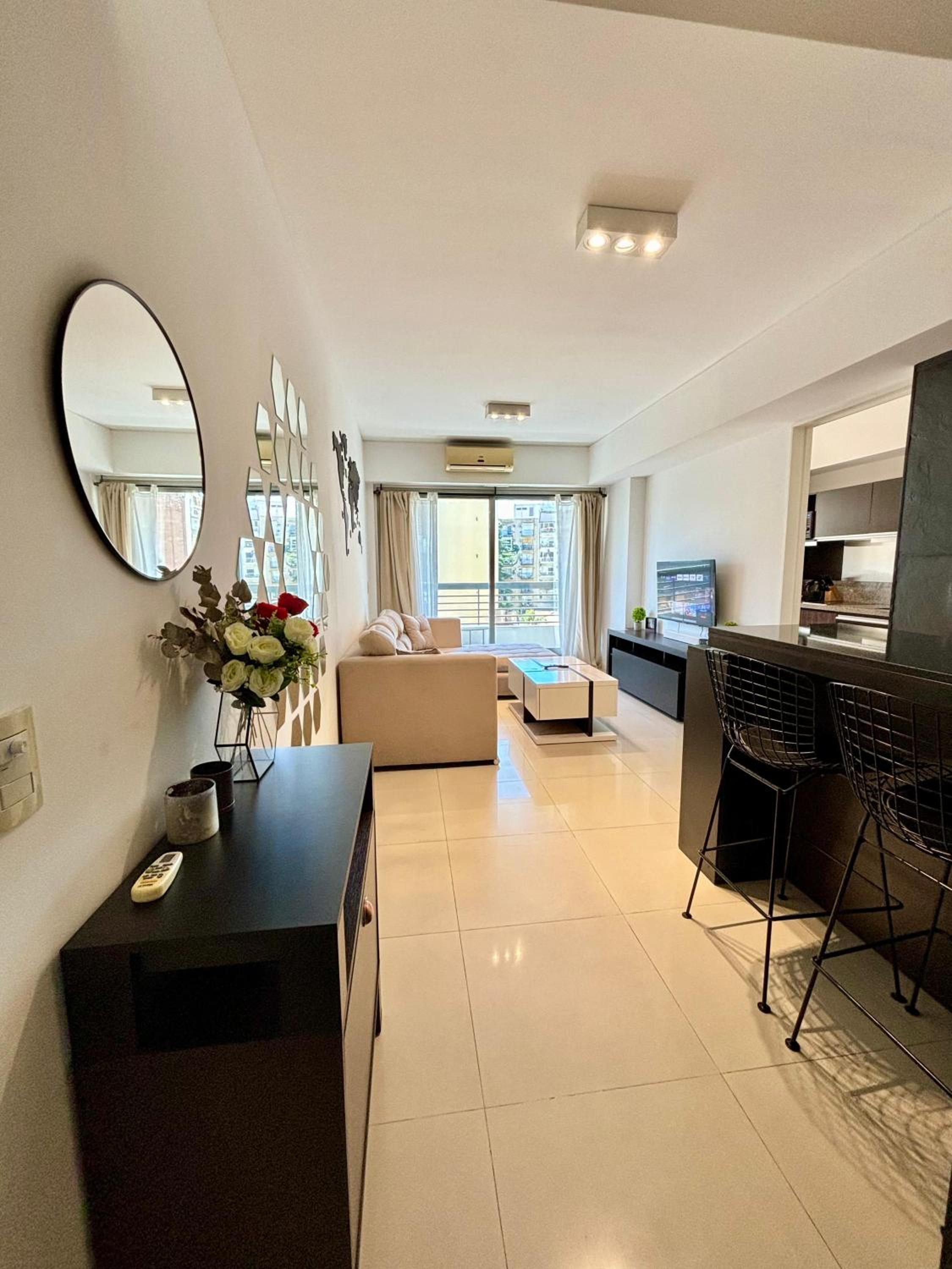 Bright modern apartment with full amenities and parking with 24hs security