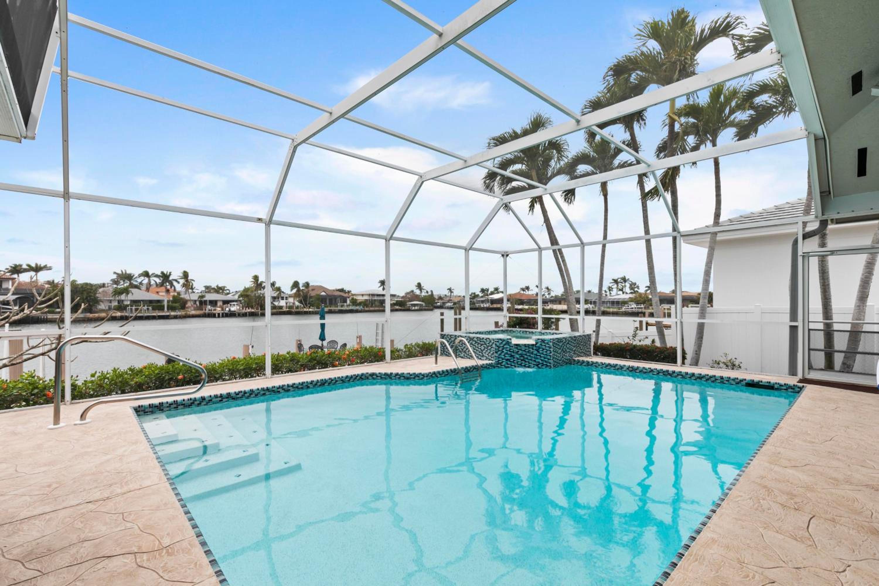 New 2024 Renovation! Gorgeous Island Oasis with SW Exposure on Marco Island view 4
