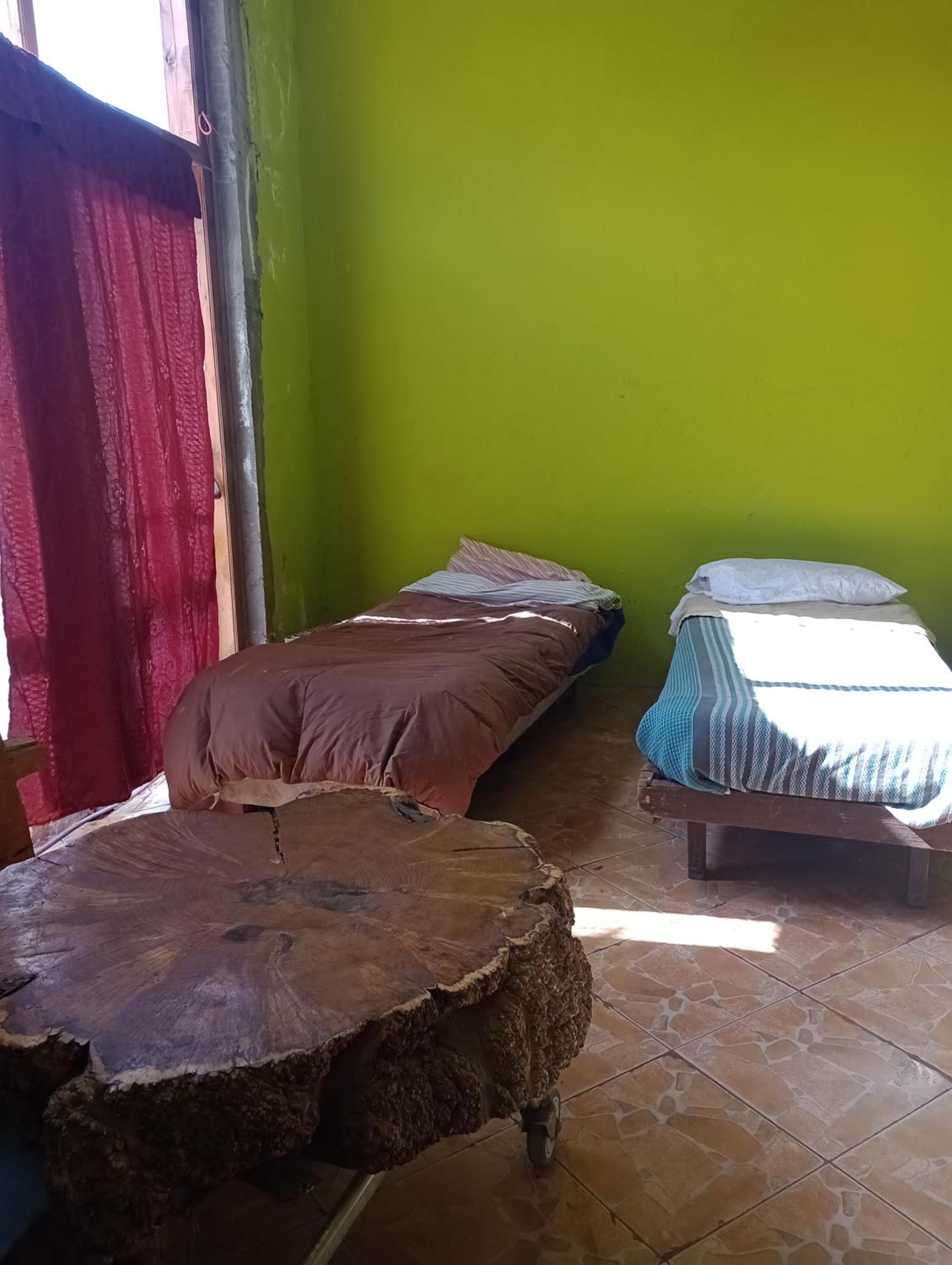Camas para descansar en habitación compartida