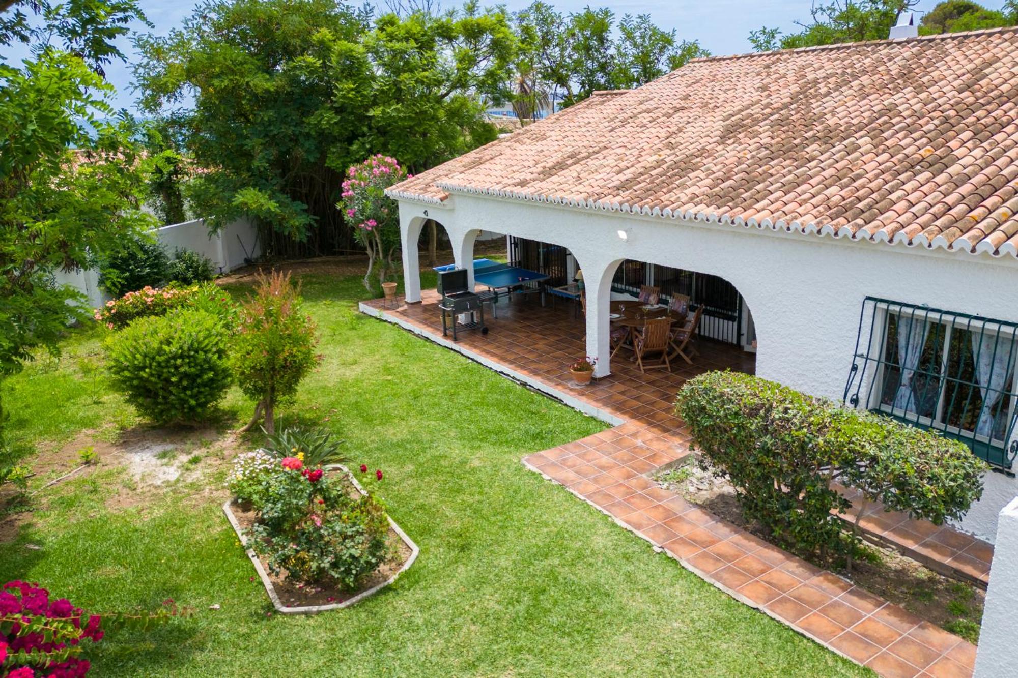 Family villa with garden next to the beach view 3