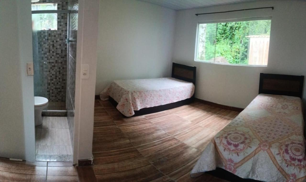 Casa de praia 2 quartos, 2 banheiros, 1 lavabo, sala, cozinha, Estacionamento para dois carros e a 300m da praia