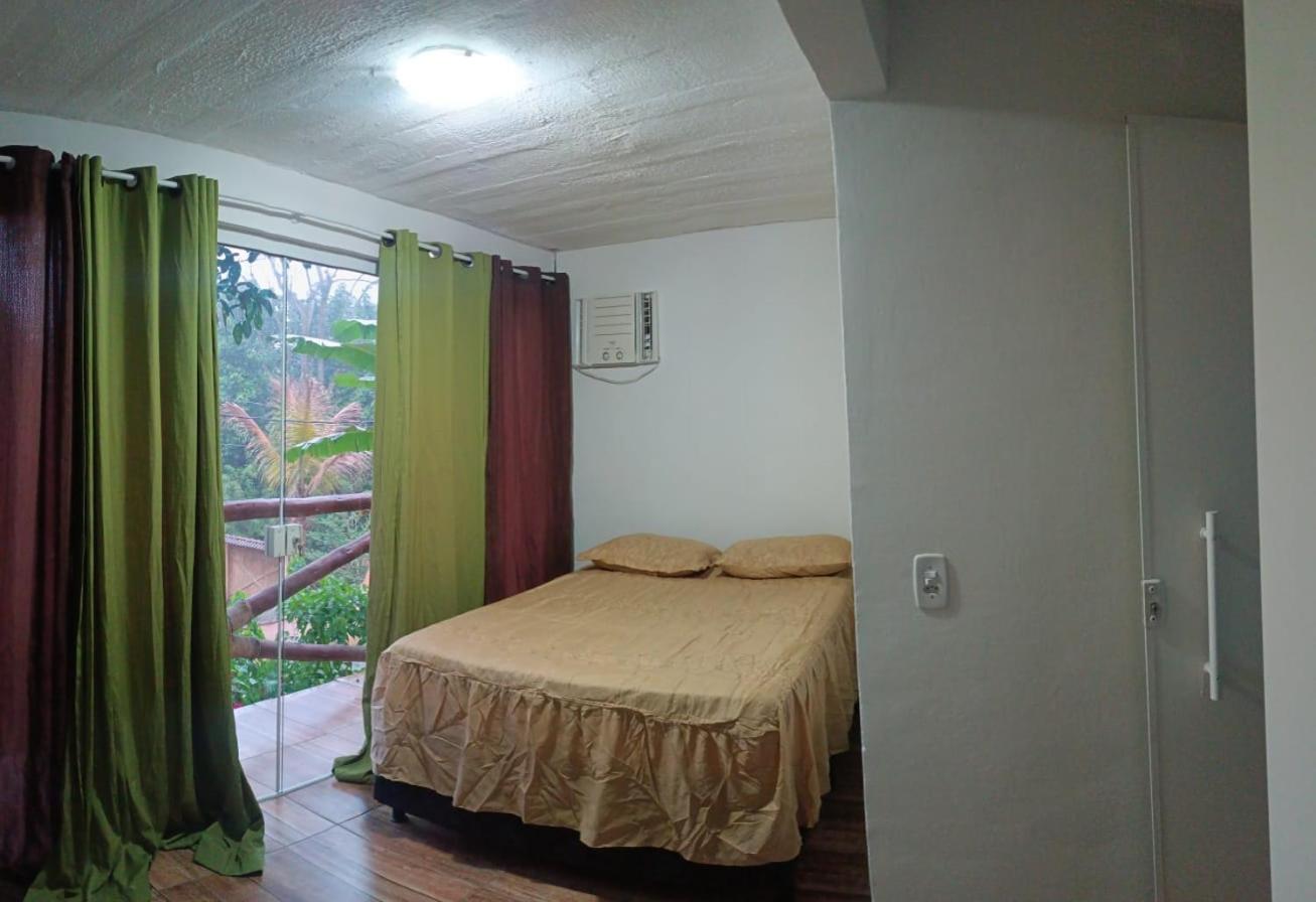 Casa de praia 2 quartos, 2 banheiros, 1 lavabo, sala, cozinha, Estacionamento para dois carros e a 300m da praia